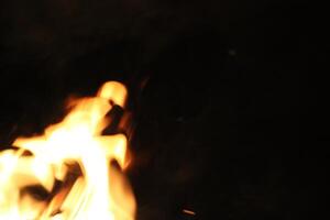 Fire Flames With A Black Background. photo