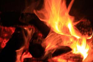 Fire Flames With A Black Background. photo