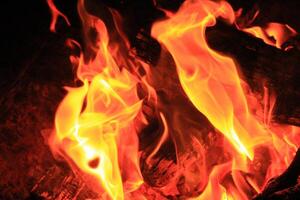 Fire Flames With A Black Background. photo