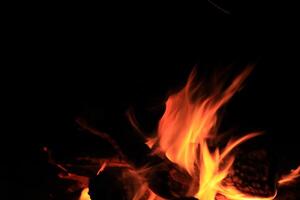 Fire Flames With A Black Background. photo
