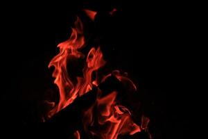 Fire Flames With A Black Background. photo