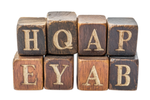 Wooden blocks arranged to showcase letters for educational activities or decor purposes in a playful setting at home or school png
