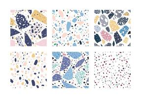 Collection of terrazzo geometric textures. Bundle of seamless patterns with colorful splinters or sprinkles on white background. Creative illustration for backdrop, textile print, flooring vector