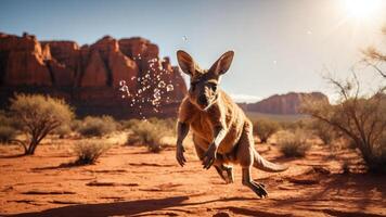 A kangaroo leaps through a desert landscape with bubbles floating in the air. photo