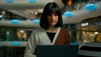 Woman working distant with laptop freelancer girl student typing computer using online web for work studying chatting in social media businesswoman browsing Internet indoors remote shopping ecommerce photo