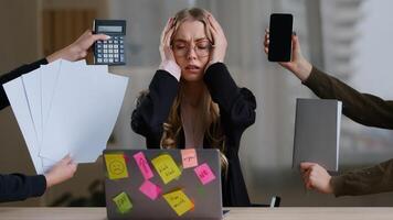 Front view overworked exhausted tired business girl woman worker manager in glasses holding head multitasking stress problem with work sitting table with laptop around calculator notebook papers phone photo