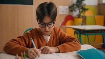 Caucasian guy boy think find idea ponder difficult task writing notes math exercise class lesson school learn write copybook kid schoolboy child pupil thinking studying primary education rise finger photo