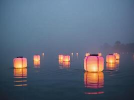 Softly Illuminated Floating Lanterns on Water photo