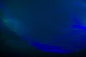 Blurred lens flare. Defocused colorful lights. Shiny glowing spots, abstract background and texture photo