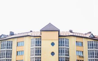 Beautiful modern multi-storey building with windows. Stylish residential building, copy space photo