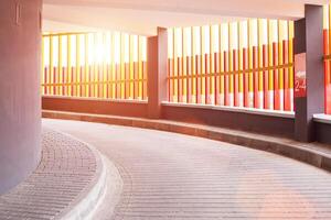 Check-in at the screw parking for cars in the city. Modern parking, sunset, background photo