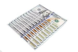 American banknotes of 100 dollars on a white background, isolate. photo