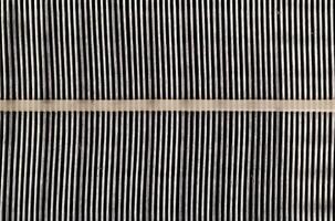 Dirty car air filter texture and background. Air filter element in a car engine, macro, damaged photo