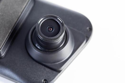 DVR camera eye on a white background, maximum recording resolution and frame rate. Car mirror with recorder. Copy space for text photo