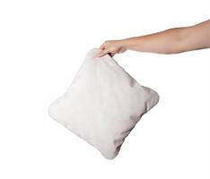 Gray pillow in a man's hand on a white background, isolate. Close-up photo
