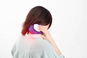 Treatment of a bruise and swelling on the girl's neck with the help of cold, trauma to the spine. White background, copy space for text photo