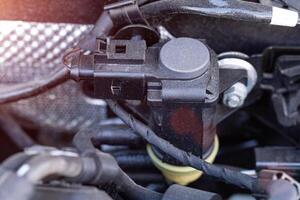 automotive sensors responsible for different readings of vehicle systems, close-up photo