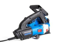 Powerful electric wall chaser for recessing in walls with two diamond blades for reinforced concrete. White background, isolate. Installer's power tool, close-up photo
