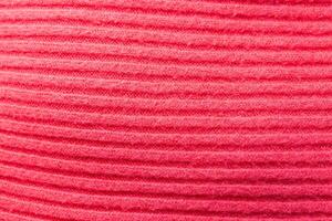 Pink sweater in a line, background, macro, traditional photo