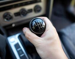 Switching a mechanical 6-speed gearbox in a car, close-up. Transmission photo