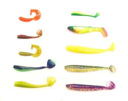 Silicone multicolored tackle bait for fishing, isolate, background photo