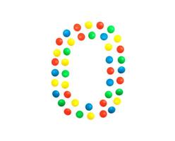 Children's numbers laid out from a multi-colored mosaic figure number 0, alphabet photo