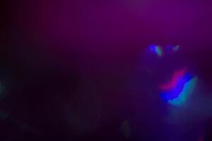 illuminated burst of multicolor light. lens flare shine effects. creative background, abstract photo