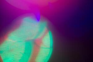 illuminated burst of multicolor light. lens flare shine effects. creative background, abstract photo