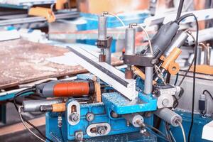 Production of PVC windows, a machine for drilling holes in the frame pvc, drill tool photo