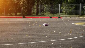 car sport, radio-controlled car moving along the asphalt road, car sport competition, radio photo