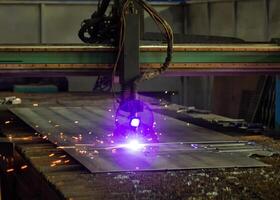 Machine for modern automatic plasma laser cutting of metals, plasma cutting with laser and laser, processing photo