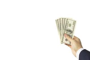 Man's hand in a jacket with dollars money, white background, dollars, copy space photo
