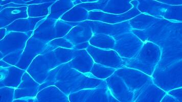 Water in the pool, sunlight is reflected, waves. Reflection and glare. Sun Glare in the Water in the Pool. video