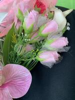 Picture of red and pink rose petals blooming , beautiful flower and authentic fragrance for wedding or valentine colorful bouquet, selective focus. photo