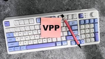Concept of VPP write on sticky notes isolated on Wooden Table. photo