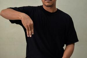 Young man making the letter M in brazilian sign language photo