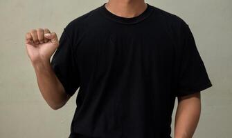Young man saying I am Fine in sign language, Yes word communication photo