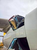 Close-up of an aircraft cargo door being opened. High quality photo