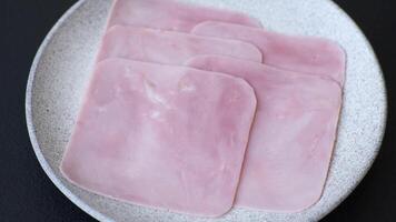 Ham cut into square slices for making delicious nutritious sandwiches for a hearty breakfast video