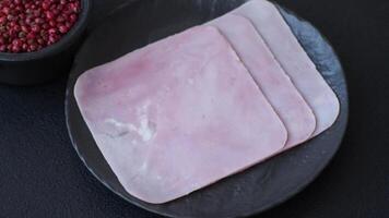 Ham cut into square slices for making delicious nutritious sandwiches for a hearty breakfast video