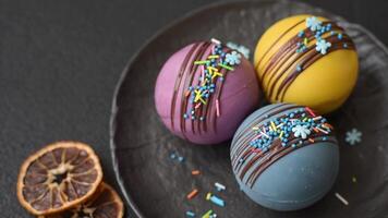 Sweet cocoa bombs with marshmallows and chocolate for making a drink with hot milk video