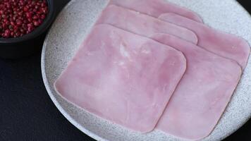 Ham cut into square slices for making delicious nutritious sandwiches for a hearty breakfast video
