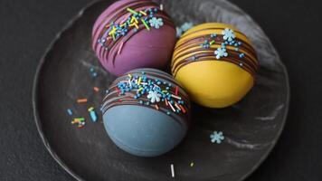 Sweet cocoa bombs with marshmallows and chocolate for making a drink with hot milk video