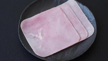 Ham cut into square slices for making delicious nutritious sandwiches for a hearty breakfast video