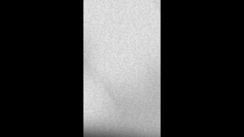 Gray speckled texture like granite or concrete. Suitable for backgrounds, textures, architectural designs, and industrialthemed concepts. Versatile asset. 4k vertical animation video