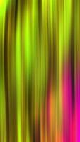 Vibrant of flowing colorful curtains on a black backdrop. Movement video