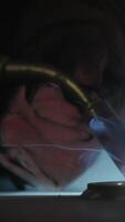 Welding Sparks Are Flying Fiercely in an Industrial Workshop Busy with Activities and Tasks. Stock Clip video