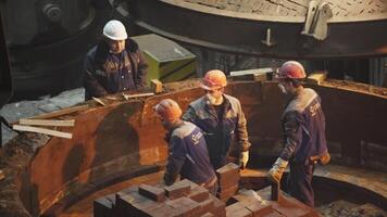 Workers on an Industrial Site Engaged in Various Heavy Machinery Operations and Tasks. Stock Clip video