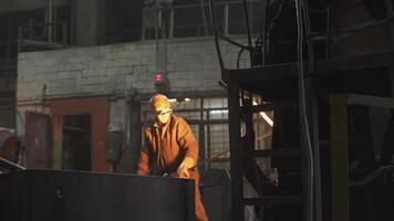 Industrial Worker in a Factory Setting Engaged in Various Tasks and Responsibilities. Stock Clip video