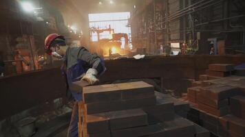 Workers operating in an Industrial Environment, focusing on Heavy Machinery and Labor aspects. Stock Clip video